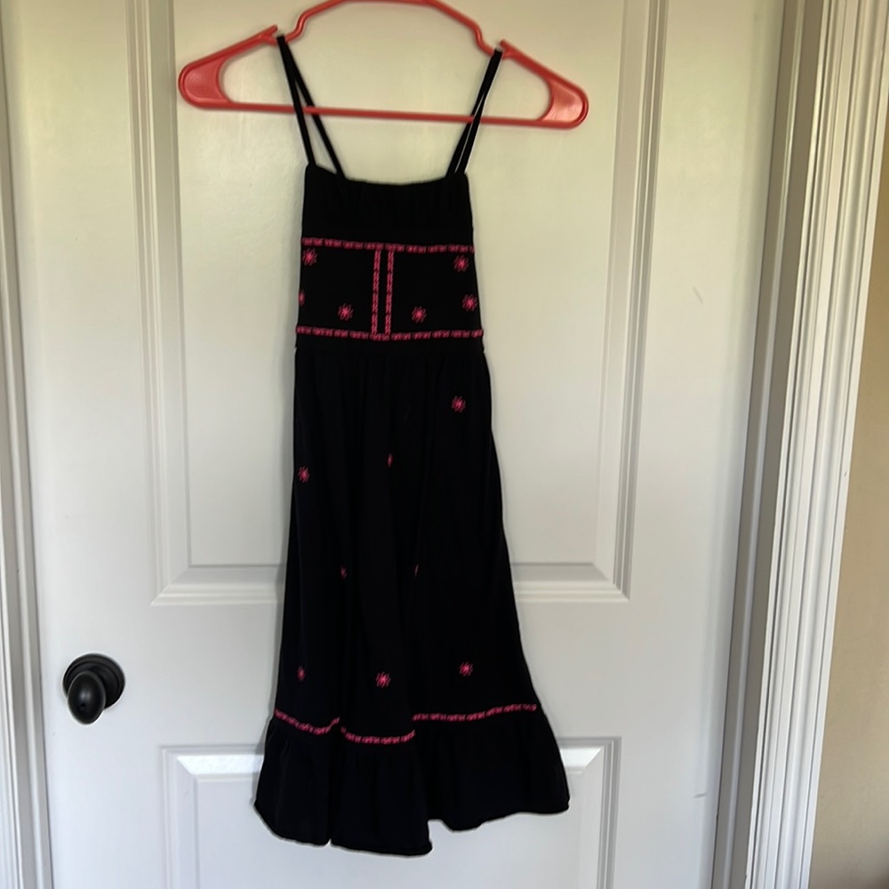 Girls summer dress with spaghetti straps.